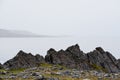 Seashore stones and slate rock, Arctic Ocean coastline