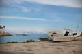 Seashore view on sea with old sailing boat