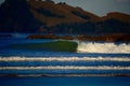 Seashores of New Zealand; beautiful seascape, bright blue ocean, and a small island far away