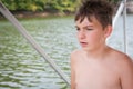 Seasick: Boy Boating Royalty Free Stock Photo