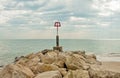 Coastal rocks scene along Bournemouth beach in Dorset. Royalty Free Stock Photo