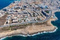 Seaside cliffs, colourful houses and streets of Qawra town in St. Paul's Bay area in the Northern Region, Malta.