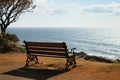 Seaside contemplation an empty bench on a cliff, peaceful solitude