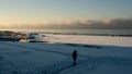 Seaside Enchantment: Snowy Coast Aglow at Golden Hour. Garciema Pludmale, Latvija