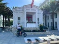 The Seaside, FL Post Office in the square in downtown with bicycles and people mingling around Royalty Free Stock Photo