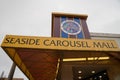 Sign for the Seaside Carousel Mall, an indoor shopping center filled with gift and souviner shops