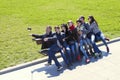 Seaside Park, Baku, Azerbaijan - March 29, 2017. A group of tourists taking a selfie in the seaside Park on the bench Royalty Free Stock Photo