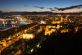 Seaside part of Malaga with Port from castle in twilight Royalty Free Stock Photo