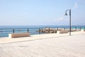 Seaside pier on Italian coast in morning light