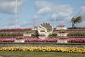 Seaside promedade display of shell statuary and bedding plants in bloom, outside in public space