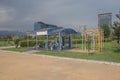 Seaside promenade in Batumi. sidewalk outdoor exercise equipment. Boat on the shore. View of Batumi Boulevard