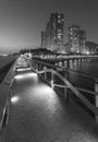 Seaside promenade and high rise residential building in Hong Kong city Royalty Free Stock Photo