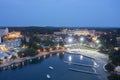 A seaside resort on the Adriatic coast at night in an electric glow. Night photography from a drone. Royalty Free Stock Photo