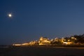 Seaside resort under moonlight