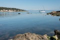 Seaside, ship, snowy mountains and blue sky