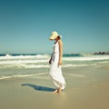 Seaside strolling. a beautiful young woman going for a walk on the beach. Royalty Free Stock Photo