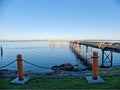 Seaside view with fishing pier Royalty Free Stock Photo