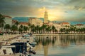 Seaside view of the town of Split, Croatia, Saint dominus belltower rising above the buildings during a golden sunset Royalty Free Stock Photo