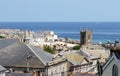 Seaside Village of St. Ives, Cornwall, UK. View over old town with typical houses and Saint ives church in afternoon summer.