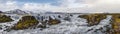 Season changing in southern Highlands of Iceland. Picturesque waterfal Tungnaarfellsfoss panoramic autumn view. Landmannalaugar