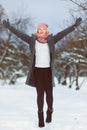 Season, christmas, holidays and people concept - smiling young woman in winter clothes outdoor Royalty Free Stock Photo