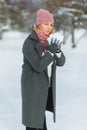 Season, christmas, holidays and people concept - smiling young woman in winter clothes outdoor Royalty Free Stock Photo