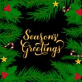 SeasonÃ¢â¬â¢s Greetings calligraphy hand lettering with fir tree branches. Merry Christmas and Happy New Year typography poster. Easy Royalty Free Stock Photo