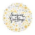 SeasonÃ¢â¬â¢s Greetings calligraphy hand lettering with gold and silver snowflakes, stars and dots. Christmas and New Year typography Royalty Free Stock Photo