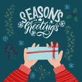 Season`s greetings. Gift in hand. Xmas card. Merry Christmas and Happy new year 2021. Royalty Free Stock Photo