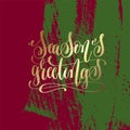 Season`s greetings - gold hand lettering on green and purple Royalty Free Stock Photo