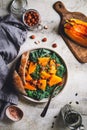 Season salad with grilled pumpkin, kale, chickpea, pepitas and nuts Royalty Free Stock Photo