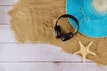 Lay flat holiday beach accessories with summer beach hat beach slippers headphones
