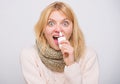 Seasonal allergy. Cute woman nursing nasal cold or allergy. Sick woman spraying medication into nose. Unhealthy girl Royalty Free Stock Photo