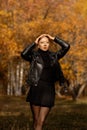 Young woman in a romantic autumn scenery Royalty Free Stock Photo