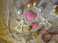 Seasonal composition from the decor of a pair of felt handmade hearts, two white angels Christmas decorations Royalty Free Stock Photo