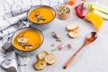 Seasonal fall autumn roasted orange pumpkin carrot soup with ingredients Royalty Free Stock Photo