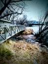 Seasonal fall colors on the nature path bridge at Sloans lake, Wyoming Royalty Free Stock Photo