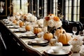 Seasonal fall table setting with small pumpkins for celebration Thanksgiving or Halloween Royalty Free Stock Photo