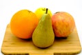 Seasonal fruit of Spain, pomegrenate, pear, apple and orange Royalty Free Stock Photo
