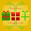 Colorful christmas gifts stacked next to each other with merry christmas and happy new year greetings on yellow background Royalty Free Stock Photo