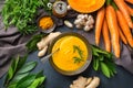 Seasonal spicy fall autumn creamy pumpkin and carrot soup Royalty Free Stock Photo