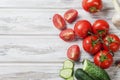 Seasonal vegetables , cherry tomatoes on a branch, cucumber, gar Royalty Free Stock Photo