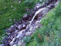 Seasonal waterfalls on the slopes of the Liechtenstein Alps mountain range and in the Saminatal alpine valley - Steg Royalty Free Stock Photo
