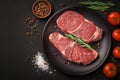 Seasoned perfection Fresh raw striploin steak with salt and herbs Royalty Free Stock Photo