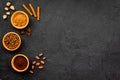 Seasoning for cooking desserts. Cinnamon, cocoa, badian on black background top view space for text Royalty Free Stock Photo