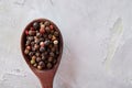 Seasoning - four kinds of pepper peas - on white background