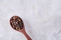 Seasoning - four kinds of pepper peas - on white background