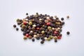 Seasoning - four kinds of pepper peas - on white background