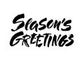 Seasons greetings calligraphy lettering text on white background with vintage paper texture. Retro greeting card for Royalty Free Stock Photo