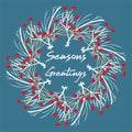 Seasons Greetings festive wreath on a blue background Royalty Free Stock Photo